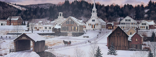 Snowy village scene with houses and a covered bridge.